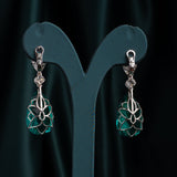Artifact VI: The Iris Emerald Drops