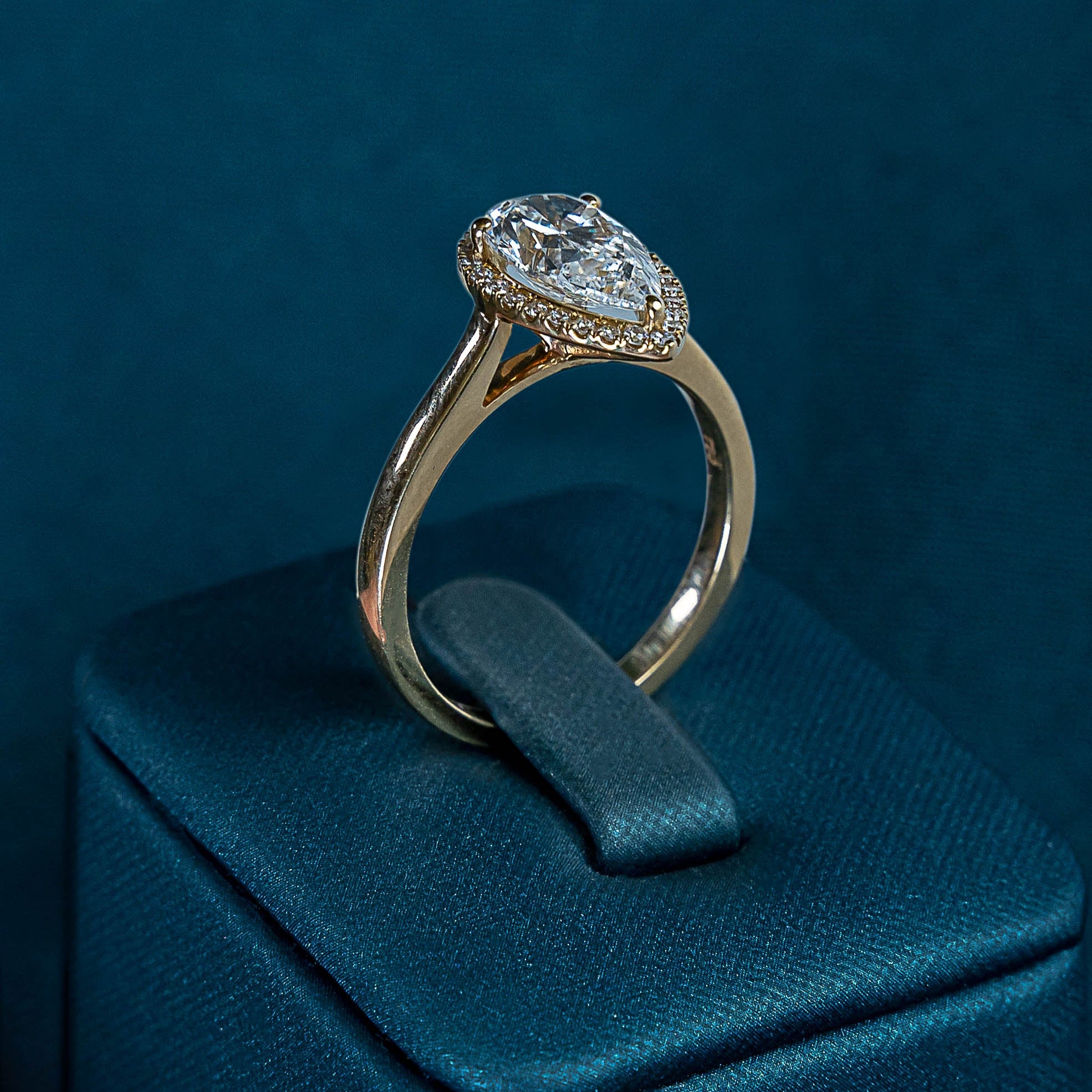 Classic Pear Halo Solitaire Ring